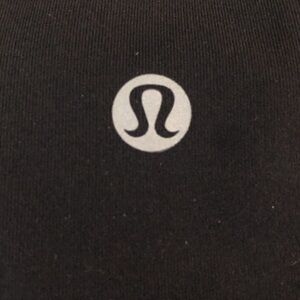 Lululemon black mid calf leggings, size 12, side of leg mesh